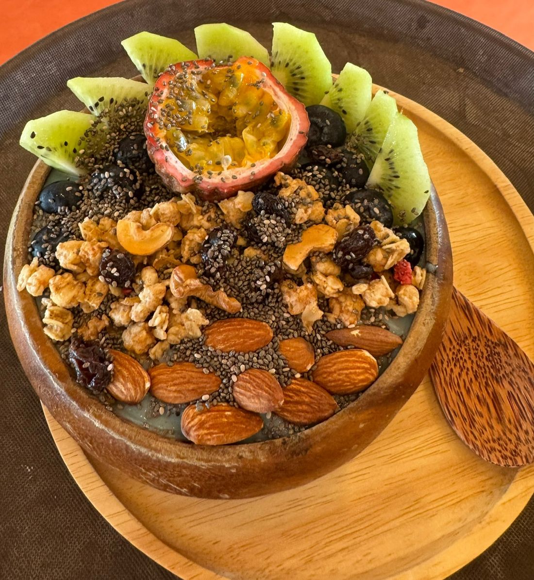 Smoothie bowl with fruit, nuts and seeds