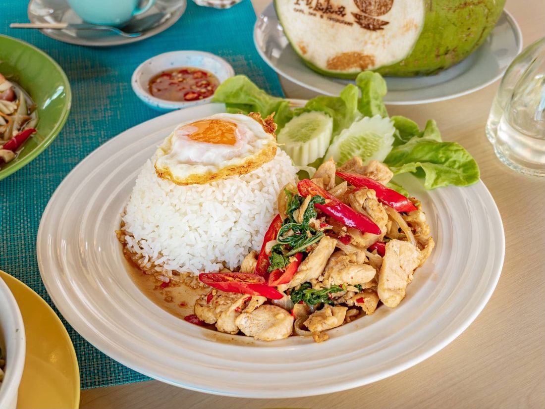 Pad kra prow with a fried egg